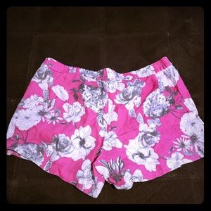 Pink shorts with white flowers